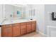 Bathroom with double vanity and bath tub and shower, offering a spa-like experience at 3697 Rolling Hills Ln, Apopka, FL 32712