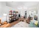 An open-concept living room features high ceilings, arches, and hardwood floors, promoting spaciousness at 3697 Rolling Hills Ln, Apopka, FL 32712