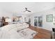 Bright living room featuring an open floor plan, modern lighting, and sliding glass doors to the lanai at 3697 Rolling Hills Ln, Apopka, FL 32712