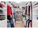 Organized walk-in closet with custom shelving and ample storage for clothes and accessories at 3697 Rolling Hills Ln, Apopka, FL 32712