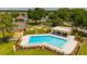 Overhead view of a community pool, playground, tennis court and picnic area at 4640 Eagle Peak Dr, Kissimmee, FL 34746