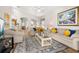 Bright living room features modern decor, plush seating, and an open layout for seamless entertaining at 4640 Eagle Peak Dr, Kissimmee, FL 34746