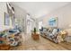 Inviting living room featuring hardwood floors, vaulted ceiling and comfortable seating at 4640 Eagle Peak Dr, Kissimmee, FL 34746