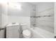 Updated bathroom with white vanity, modern fixtures, and tiled shower/tub combo at 4824 Shoshone St, Orlando, FL 32819