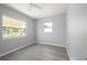 Inviting bedroom with two bright windows and stylish flooring at 4824 Shoshone St, Orlando, FL 32819