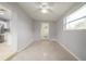 Bright dining area with tile floors, ceiling fan, and easy access to the kitchen at 4824 Shoshone St, Orlando, FL 32819