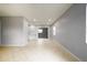 Spacious living room with tile floors that flows into additional rooms at 4824 Shoshone St, Orlando, FL 32819