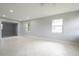 Bright and spacious living room with tile flooring and recessed lighting at 4824 Shoshone St, Orlando, FL 32819