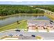 The community features townhomes with garages, well-manicured grounds, and a scenic pond for outdoor enjoyment at 4829 Cedar Bay Ter, Kissimmee, FL 34746