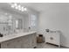 Bathroom boasts double sinks, a modern vanity, and bright, natural light at 4829 Cedar Bay Ter, Kissimmee, FL 34746