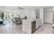 Bright, open-concept kitchen and dining area featuring modern appliances and elegant decor with plenty of room to entertain at 4829 Cedar Bay Ter, Kissimmee, FL 34746