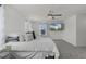 Light-filled main bedroom with neutral walls, soft carpet and a decorative ceiling fan at 4829 Cedar Bay Ter, Kissimmee, FL 34746