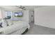 Bright main bedroom featuring carpet and ceiling fan and large windows at 4829 Cedar Bay Ter, Kissimmee, FL 34746
