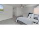 Bright main bedroom with large windows and plush carpet at 4829 Cedar Bay Ter, Kissimmee, FL 34746