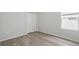 Light and bright bedroom features a closet and a window at 5079 Royal Point Ave, Kissimmee, FL 34746