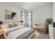 Comfortable bedroom featuring natural light, neutral décor, and ample space, creating a cozy and inviting atmosphere at 5079 Royal Point Ave, Kissimmee, FL 34746