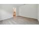 Spacious bedroom features wood floors and bathroom ensuite at 5079 Royal Point Ave, Kissimmee, FL 34746