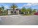 A modern clubhouse facility with accessible parking and manicured landscaping at 5079 Royal Point Ave, Kissimmee, FL 34746