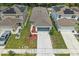 A manicured lawn and landscaping complement the property's clean exterior at 5079 Royal Point Ave, Kissimmee, FL 34746