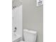 The bathroom has a white toilet and a white tiled tub with shower features at 514 Orange Dr # 31, Altamonte Springs, FL 32701