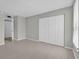 The bedroom features a closet with white doors and a door to another room at 514 Orange Dr # 31, Altamonte Springs, FL 32701