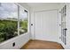 Bedroom boasting a window with a view of a pool, along with a spacious closet at 5168 Conroy Rd # 35, Orlando, FL 32811
