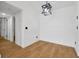 A dining area features light wood floors and a modern pendant light fixture at 5168 Conroy Rd # 35, Orlando, FL 32811
