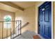 Close-up of a front door with a porch showcasing the entrance to this home at 5168 Conroy Rd # 35, Orlando, FL 32811