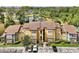 Condominium complex featuring well-maintained landscaping, private entrances, and convenient parking spaces at 5168 Conroy Rd # 35, Orlando, FL 32811