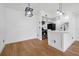 Open-concept kitchen featuring new appliances and a spacious island. Ready for entertaining! at 5168 Conroy Rd # 35, Orlando, FL 32811