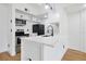 Galley kitchen featuring stainless appliances, modern sink faucet and white countertops at 5168 Conroy Rd # 35, Orlando, FL 32811