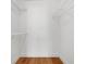 Walk-in closet with white wire shelving at 5168 Conroy Rd # 35, Orlando, FL 32811