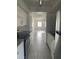 Efficient kitchen featuring modern stainless steel appliances and white cabinetry at 53 W Marbrisa Way, Kissimmee, FL 34743