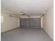 Spacious garage with painted floors and cinder block walls at 5311 Ansonia Ct, Orlando, FL 32839