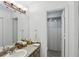 Bathroom vanity featuring a sink, decor, and a view to the shower with white shower curtain at 628 Riverpark Cir, Longwood, FL 32779
