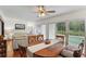 Elegant dining area with views of the pool and living room, perfect for entertaining at 628 Riverpark Cir, Longwood, FL 32779