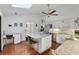 Modern kitchen with stainless steel appliances, granite countertops and island seating at 628 Riverpark Cir, Longwood, FL 32779