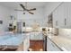 Modern kitchen featuring stainless steel appliances, granite countertops and island at 628 Riverpark Cir, Longwood, FL 32779