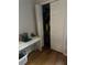 Bedroom featuring a desk and open closet provides an organized and efficient space at 6450 Alcalde Ct # 106, Orlando, FL 32835