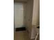 Clean entryway featuring a tile floor, a white door, and a small table to the side at 6450 Alcalde Ct # 106, Orlando, FL 32835