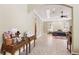 Bright bedroom view showing the interior architecture that transitions to a bathroom through an arched doorway at 6686 Se 135Th St, Summerfield, FL 34491