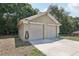 A spacious detached two-car garage offering plenty of room for vehicles and extra storage space at 6686 Se 135Th St, Summerfield, FL 34491