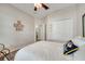 Bright bedroom with closet, decor, and a ceiling fan at 6837 Pasturelands Pl, Winter Garden, FL 34787