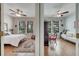 Spacious bedrooms featuring ceiling fans, hardwood floors and natural light through the windows at 6837 Pasturelands Pl, Winter Garden, FL 34787