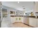 Open kitchen featuring stainless steel appliances, ample counter space and views into the living areas at 6837 Pasturelands Pl, Winter Garden, FL 34787