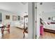 Open-concept from living room to bedroom, with hardwood floors and natural light at 6837 Pasturelands Pl, Winter Garden, FL 34787