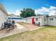 Inviting backyard featuring a brick patio, ideal for outdoor relaxation and gatherings at 731 Guernsey St, Orlando, FL 32804