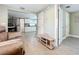 Living room view showing tile floor, with kitchen and bathroom visible in the background at 731 Guernsey St, Orlando, FL 32804