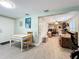 Open living space with tile flooring, a view to another room, and an inviting atmosphere at 731 Guernsey St, Orlando, FL 32804