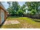 Spacious backyard with a privacy fence offers plenty of room to enjoy outdoor activities at 7616 Southwick St, Orlando, FL 32818